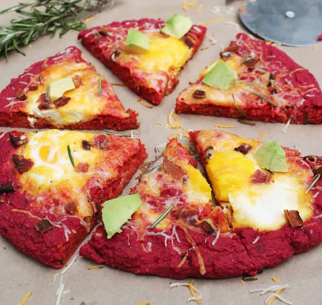 beet crust breakfast pizza with rosemary and eggs and bacon