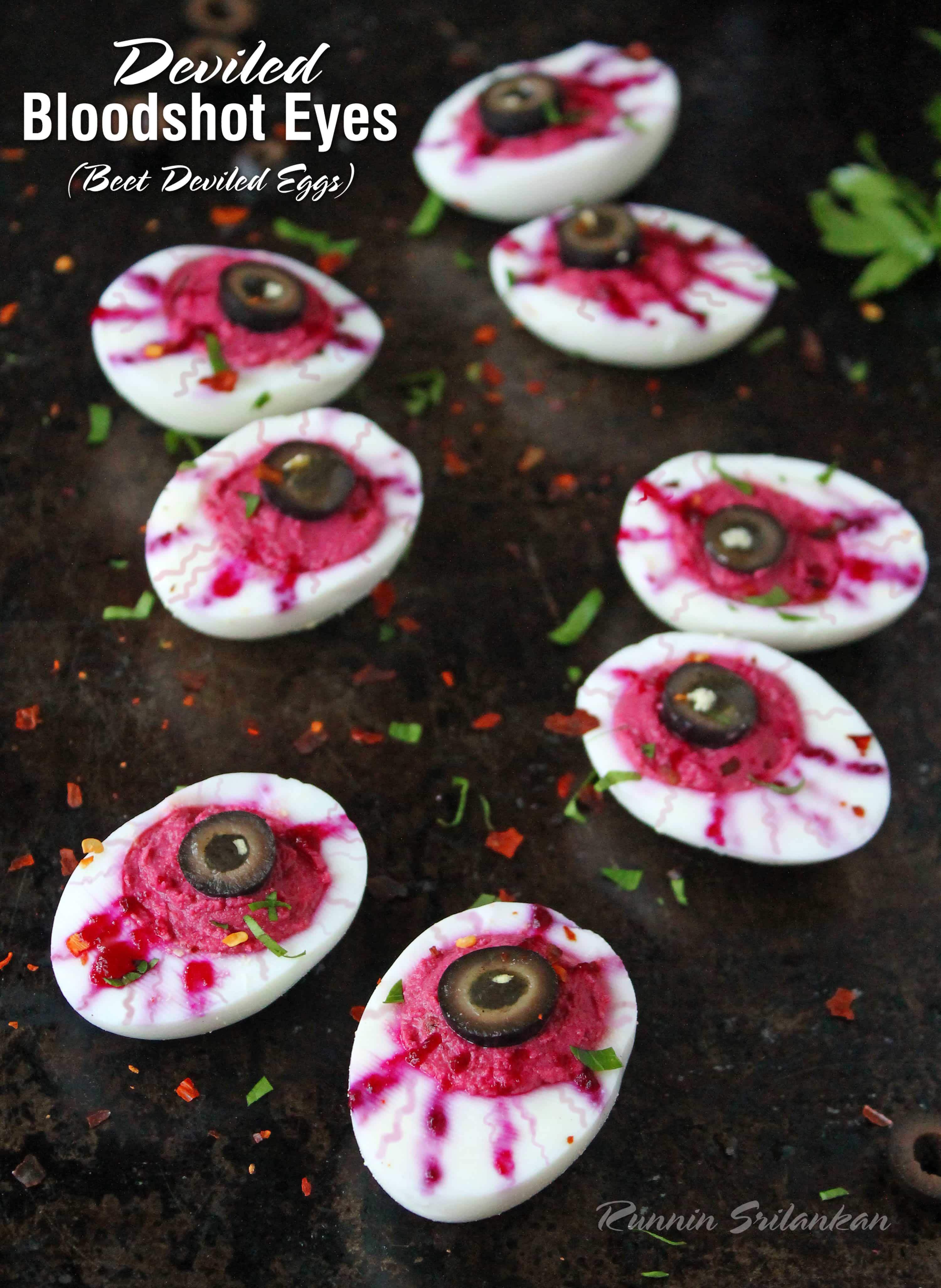 Deviled Egg Bloody Eyeballs - Deviled eggs loose the mayo and gain a bit of healthy in these bloody beety eyeballs!