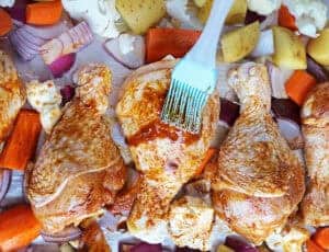 brushing veggies and chicken with delicious spice mix - Copy