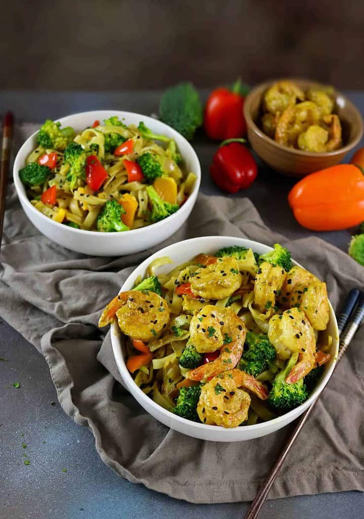 Rice Noodle, Shrimp & Veggie Coconut Curry Stir Fry - half curry, half stir fry, this recipe is sure to delight your tastebuds and it is a cinch to pull together! See the recipe at http://RunninSrilankan.com