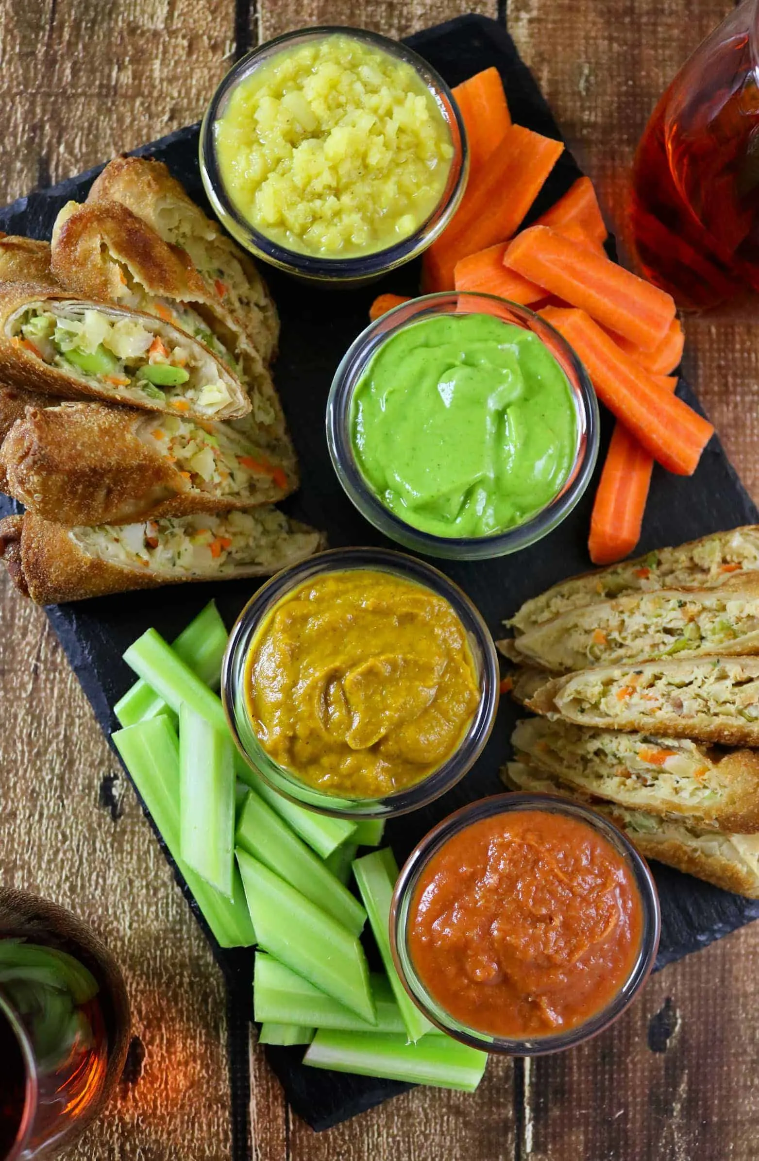 Girl's Night in with Van's Kitchen Egg Rolls and tomato pineapple dip, curried pumpkin dip, apple chutney dip and avocado spinach dip. #EggRollWithIt #ad