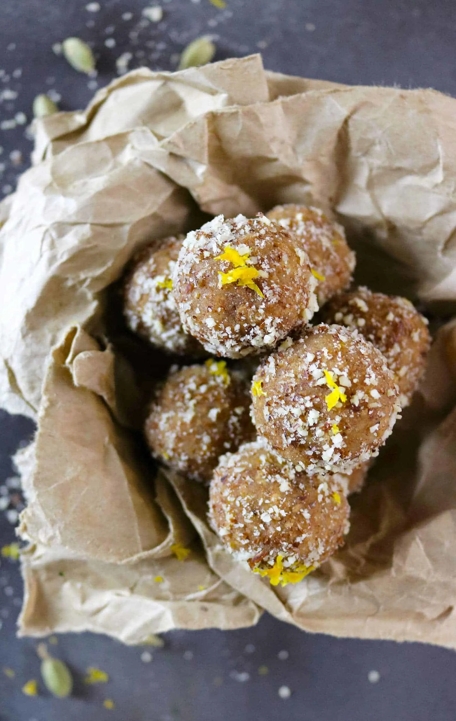 These Orange Cardamom Bites are gluten-free, dairy-free, and refined sugar-free are a wonderful no-bake. energizing snack - Recipe at RunninSrilankan.com