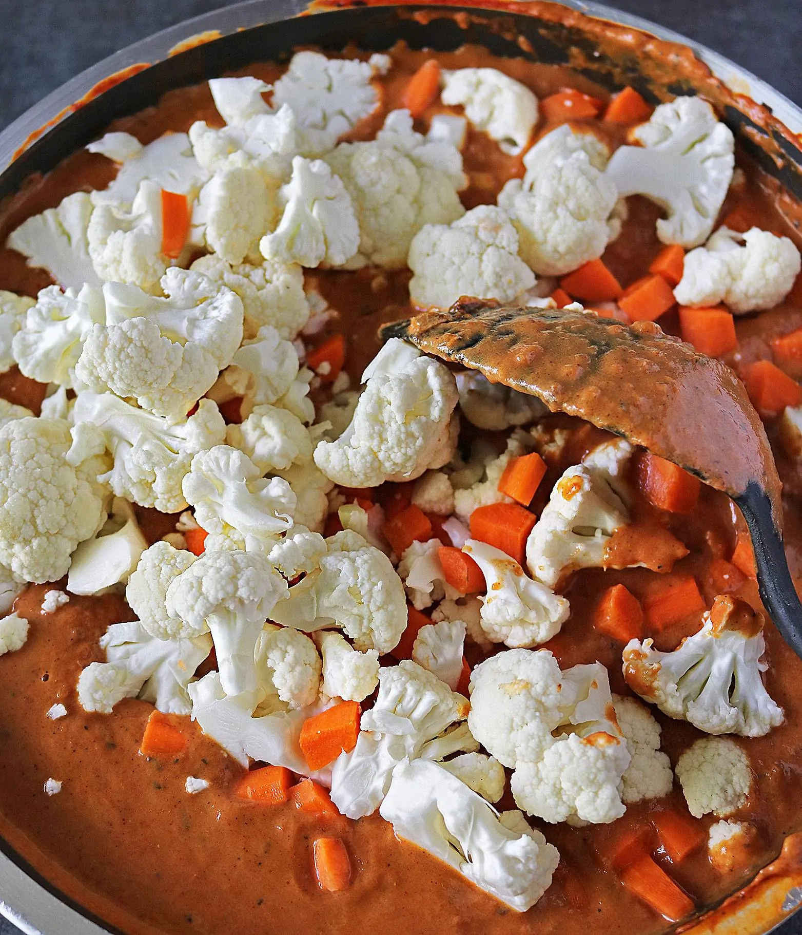 Adding Cauliflower Carrots In Tikka Sauce