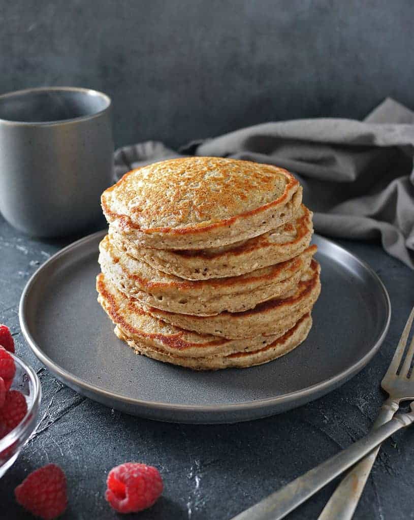 Flourless pancakes stacked high and made with Only Oats, eggs, milk, baking powder, cinnamon and nutmeg and salt