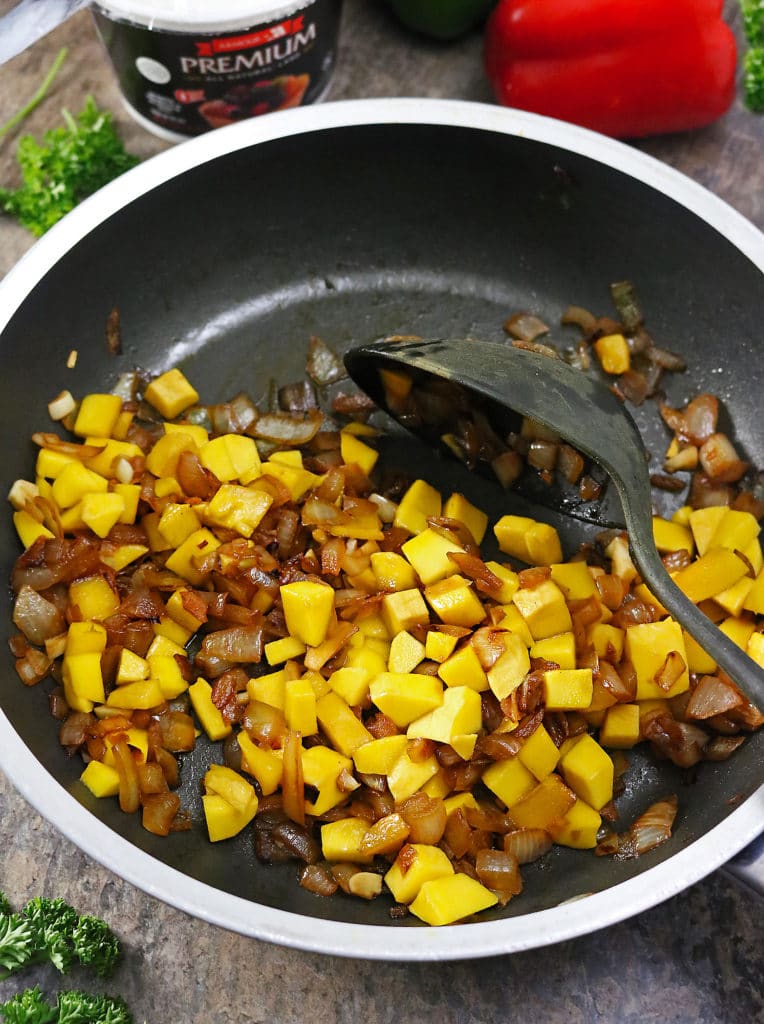 Mangoes, Ginger, Garlic, and Onions Sauteing