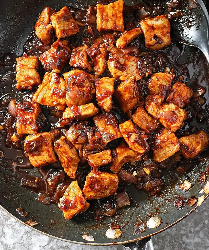 Sweet And Spicy Pork Simmering