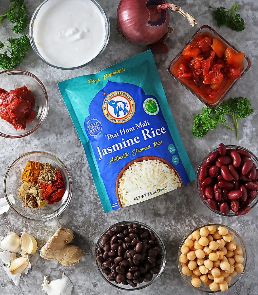 Ingredients for making 3 bean curry around a package of Super Lucky Elephant Jasmine Rice