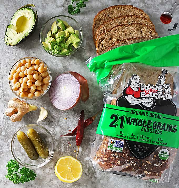 Overhead photo of Dave’s Killer Bread and ingredients to make Chickpea Avocado Salad Sandwiches