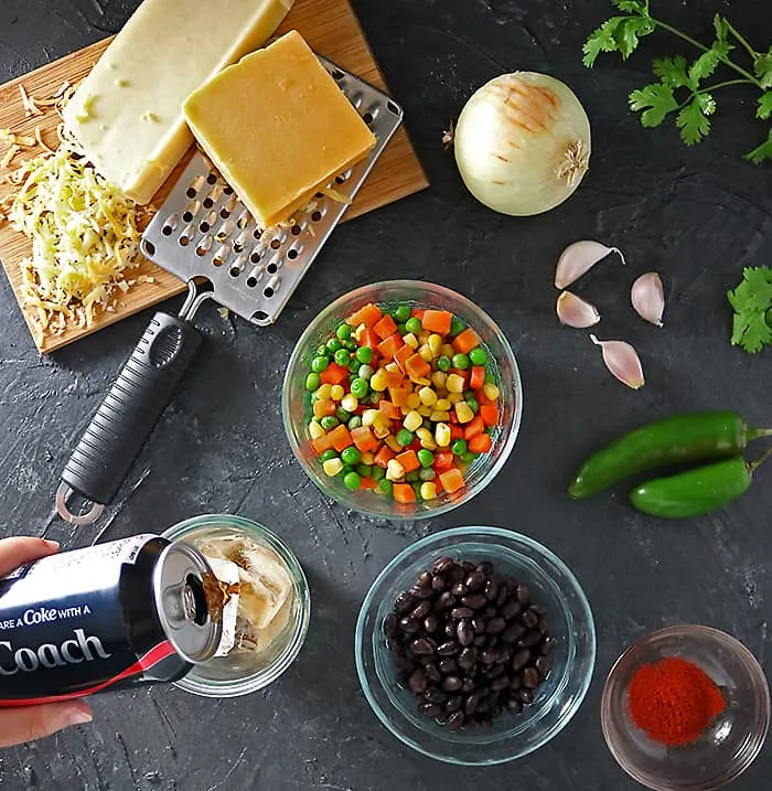 Photo of Coca-Cola And-Ingredients For Spicy Veggie Quesadilla