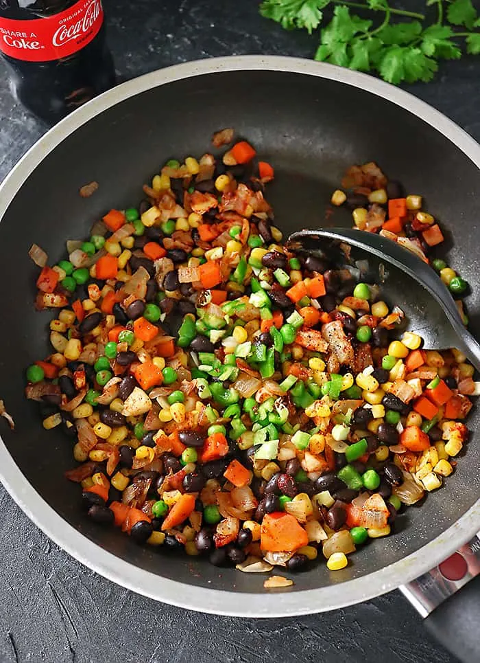 Overhead photo of veggies being sauteed for quesadillas