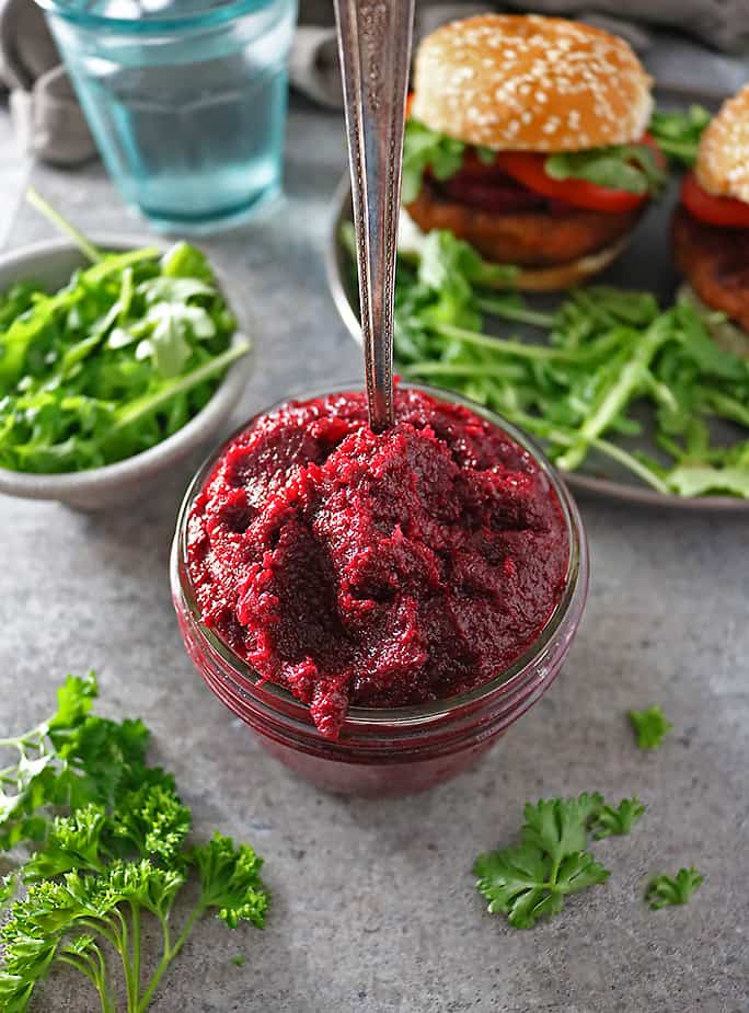 Beet Onion Jam with Beyond Burgers in the background