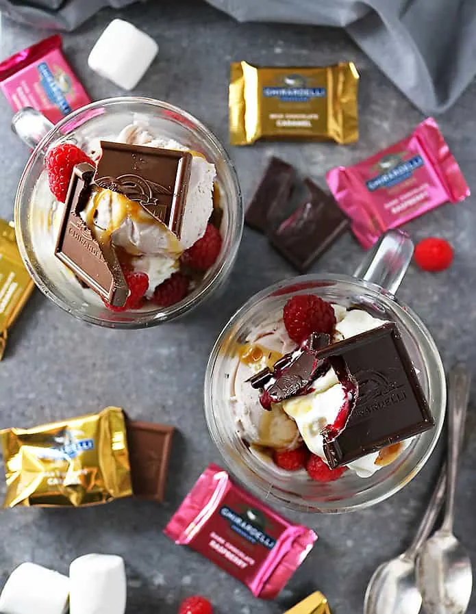 Photo of Ghirardelli S'mores Mug Cakes topped with ice cream and fruit and chocolate