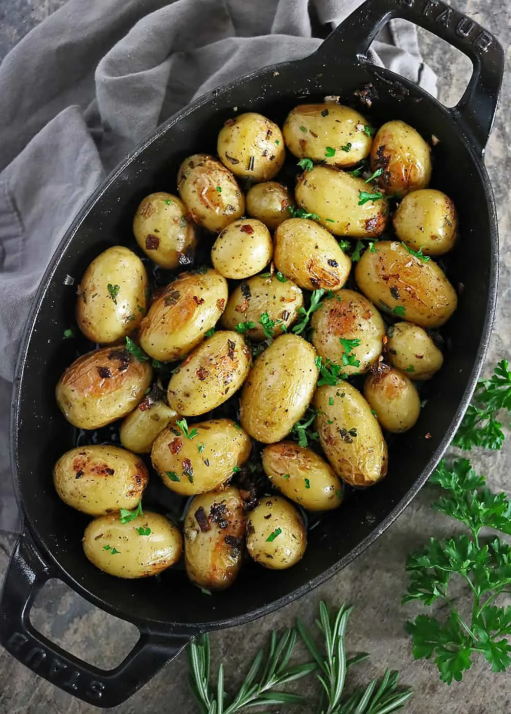 Gold Potatoes With Bacon in a Cast Iron Skillet 