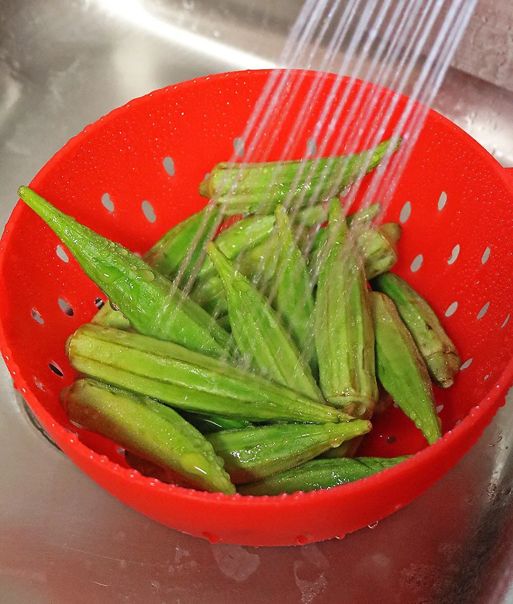 Rinsing Okra in preparation for this recipe
