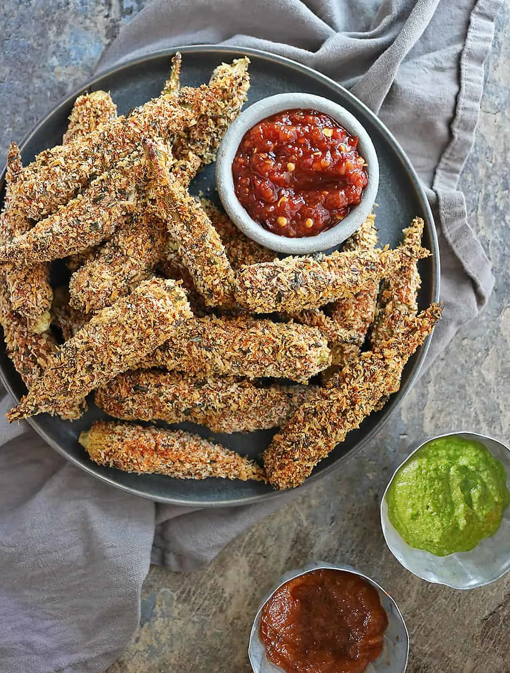 Coated with deliciously spiced egg wash and spiced panko breading, these Crispy Spicy Air Fryer Okra are a must make!