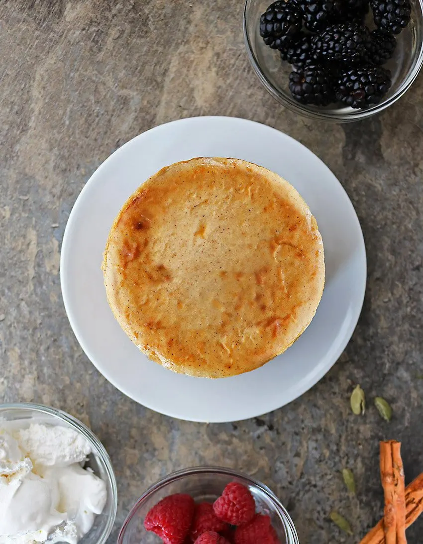 Easy AirFryer Cinnamon Cheesecake with whipped cream and fresh berries