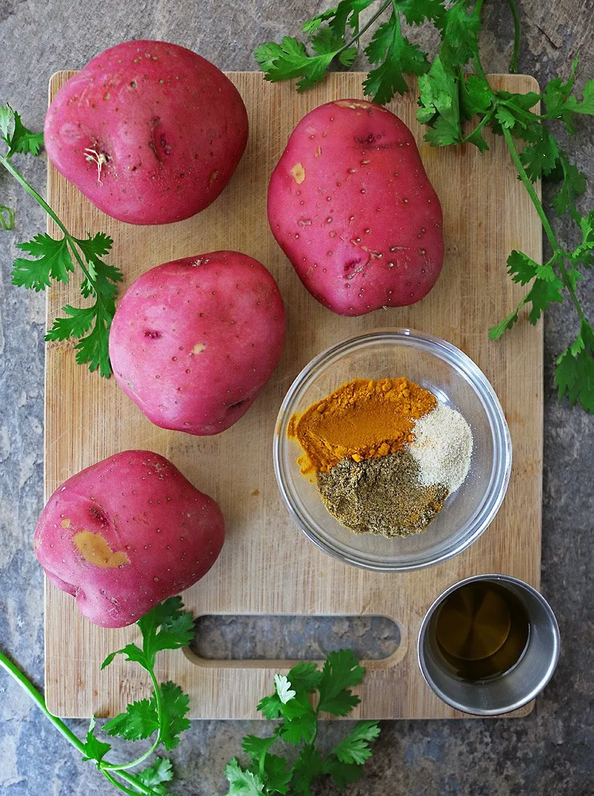 Ingredients To Make Spiced Turmeric Potatoes.