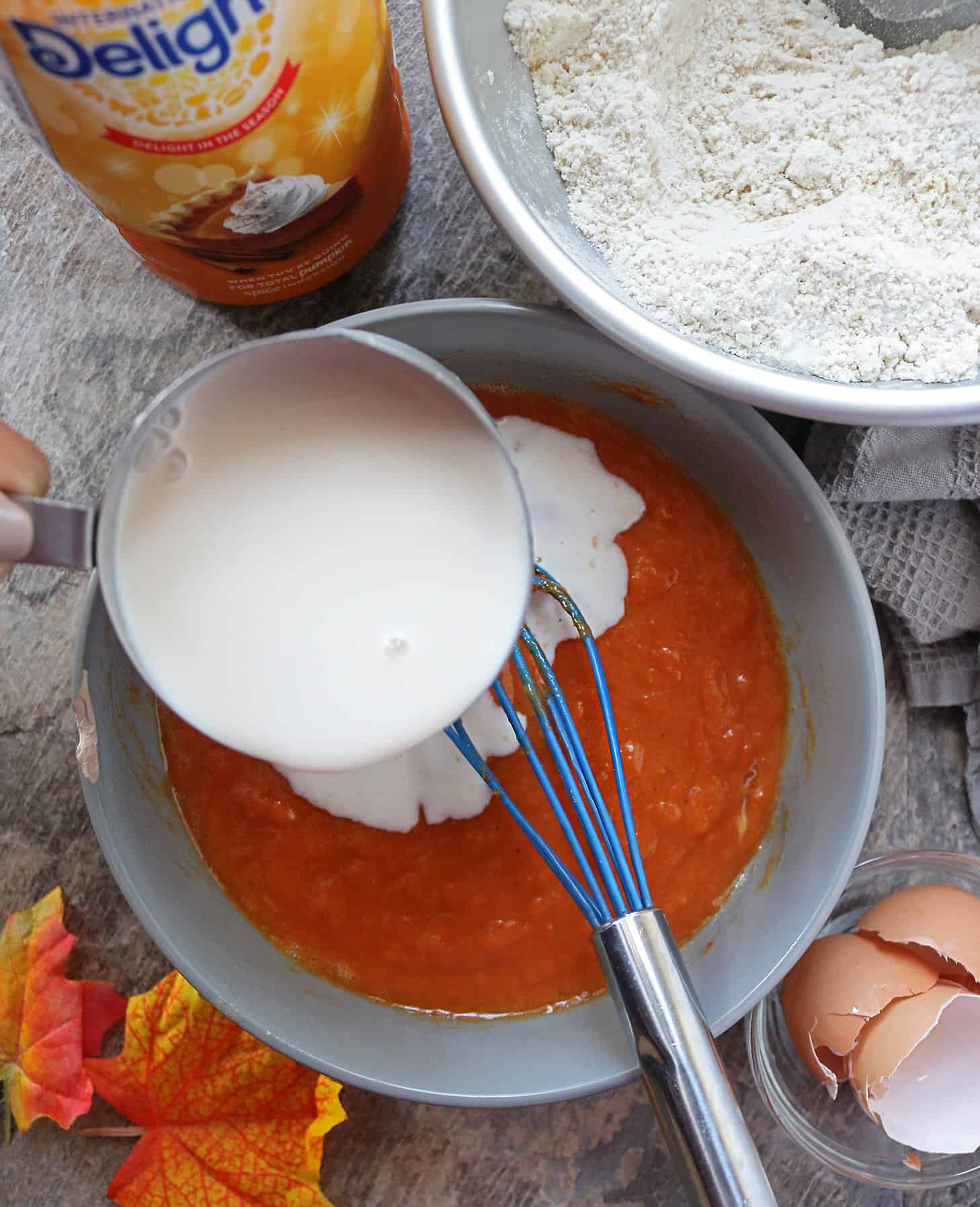 Mixing In International Delight Pumpkin Spice Creamer Into Wet Ingredients For NoFlip Pancakes