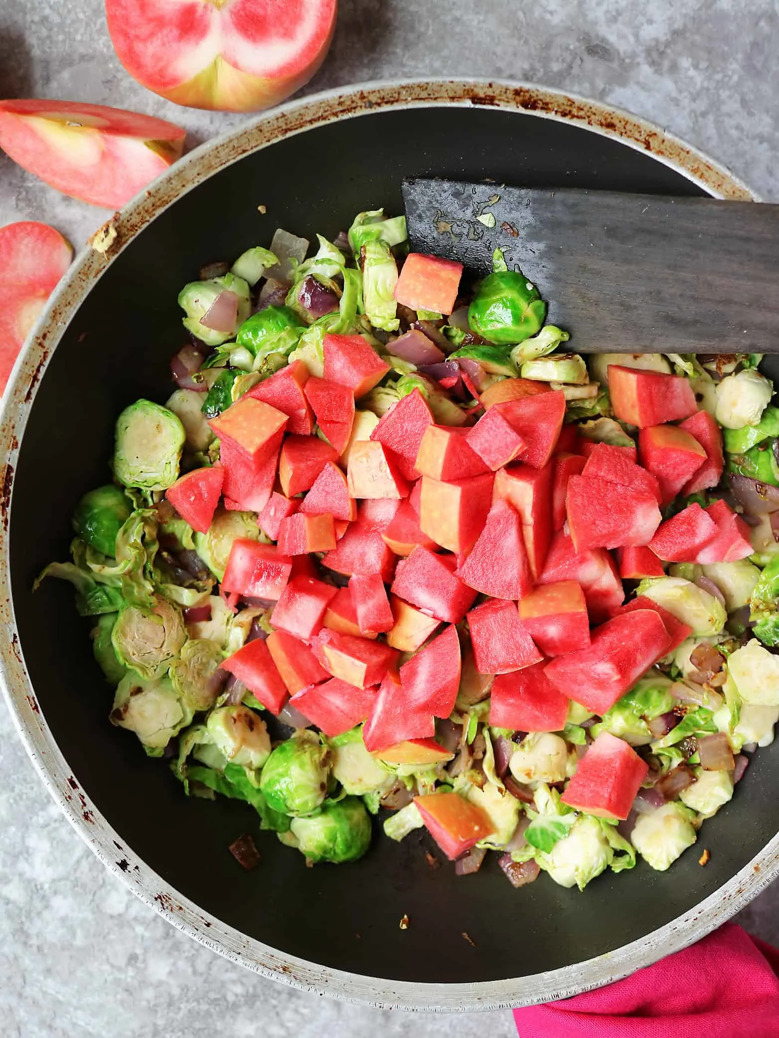 Making Sauteed Brussels Sprout Apple Salad For Festive Christmas dinners.