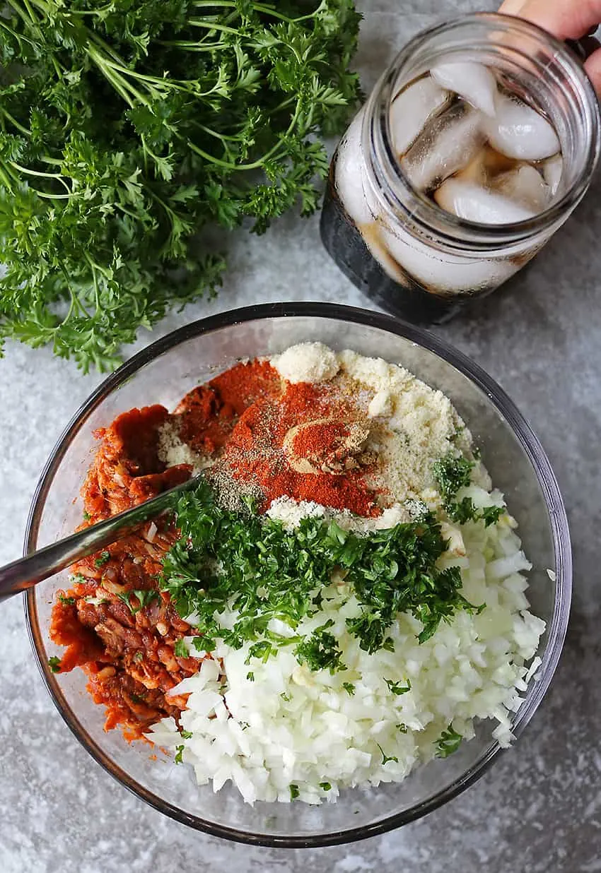 Mixing Ingredients Together To Make Chorizo Balls Recipe for the holidays