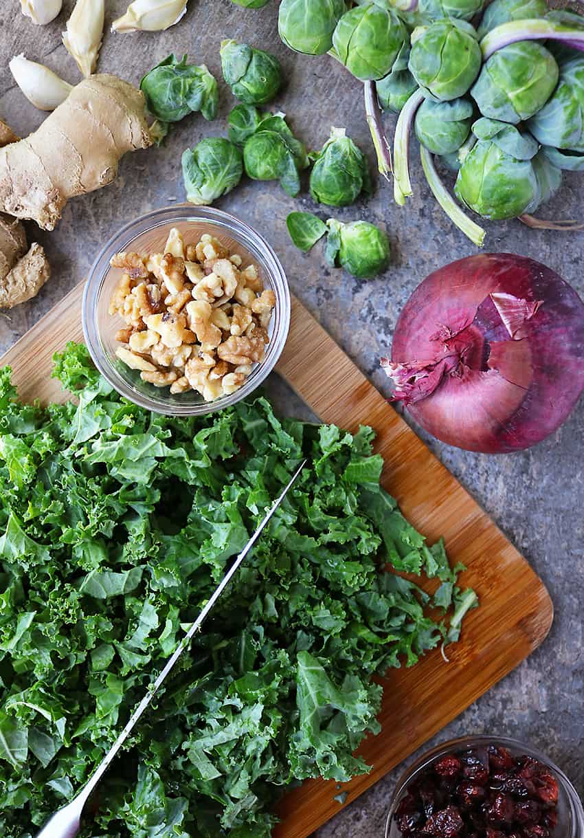 Ingredients to make Brussels Sprouts Kale Saute With Cranberries Walnuts