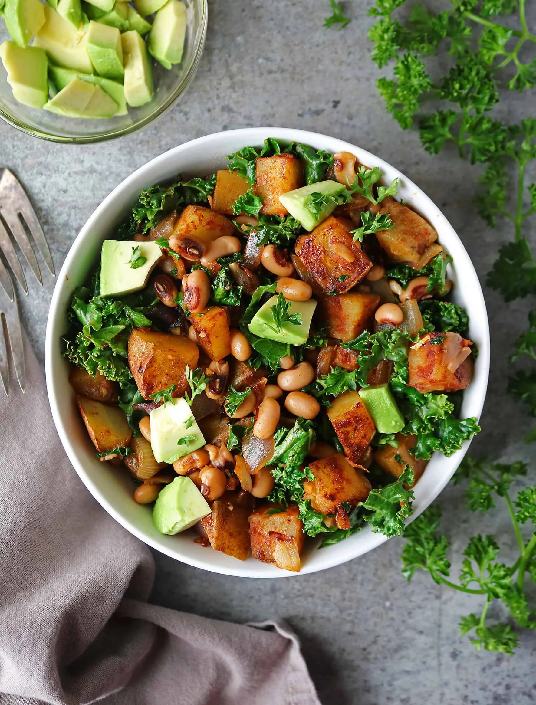 Bowl of wholesome, clean, Vegan Black-Eyed peas and Greens Hash!