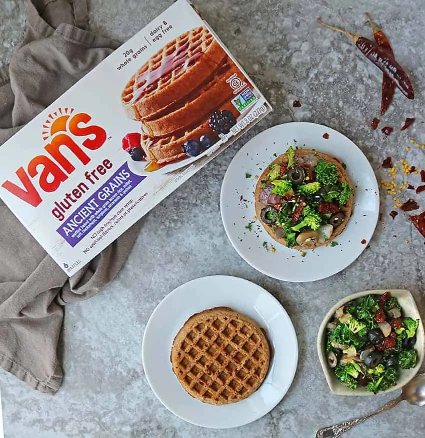 Well-toasted Van’s® Gluten Free Ancient Grains Waffles topped with a sautéed mix of kale, broccoli, onion, sundried tomatoes, mushrooms and olives.