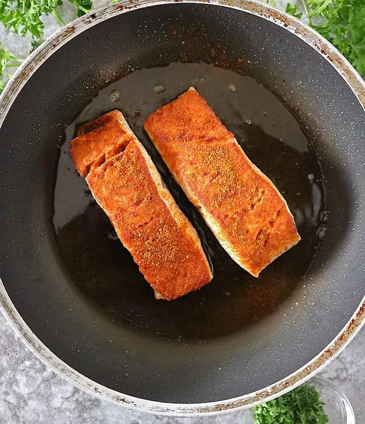 Making Heart Healthy Harissa Salmon on stove top