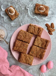 a plate of Gluten-free Dairy-free paleo carrot cake bars for Easter.