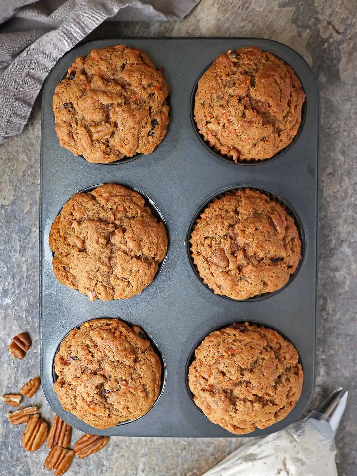 Tasty carrot cake cupcakes just out of the oven.