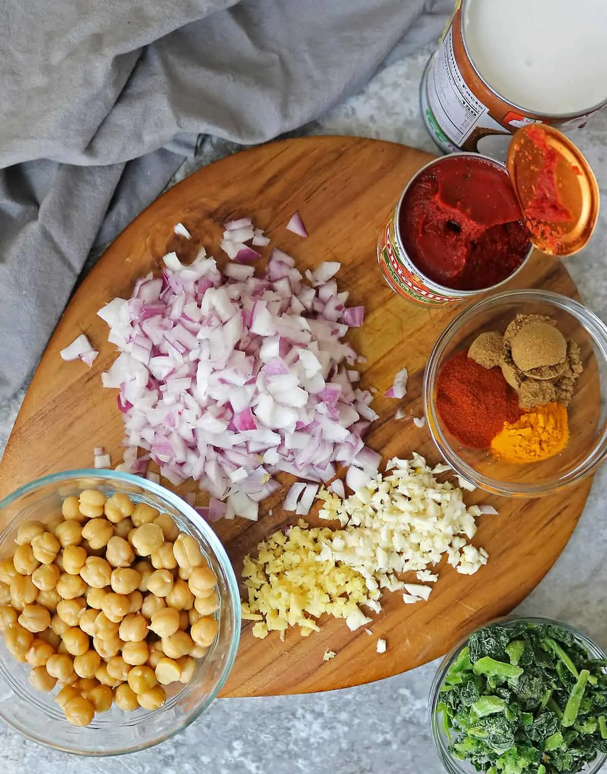 All the Ingredients to make chickpea spinach curry