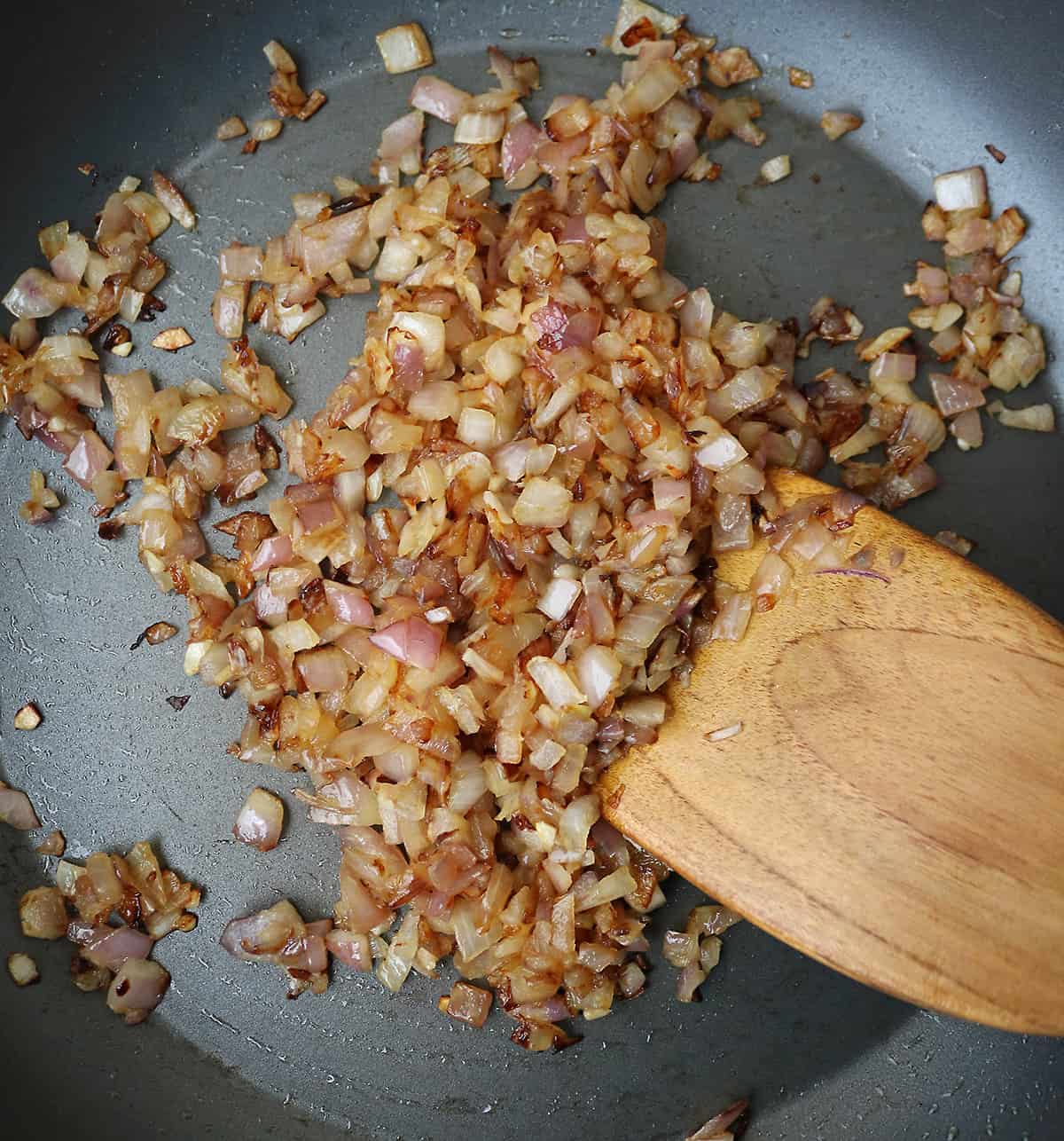 Saute red onions to just caramelized as it is key to a good curry base