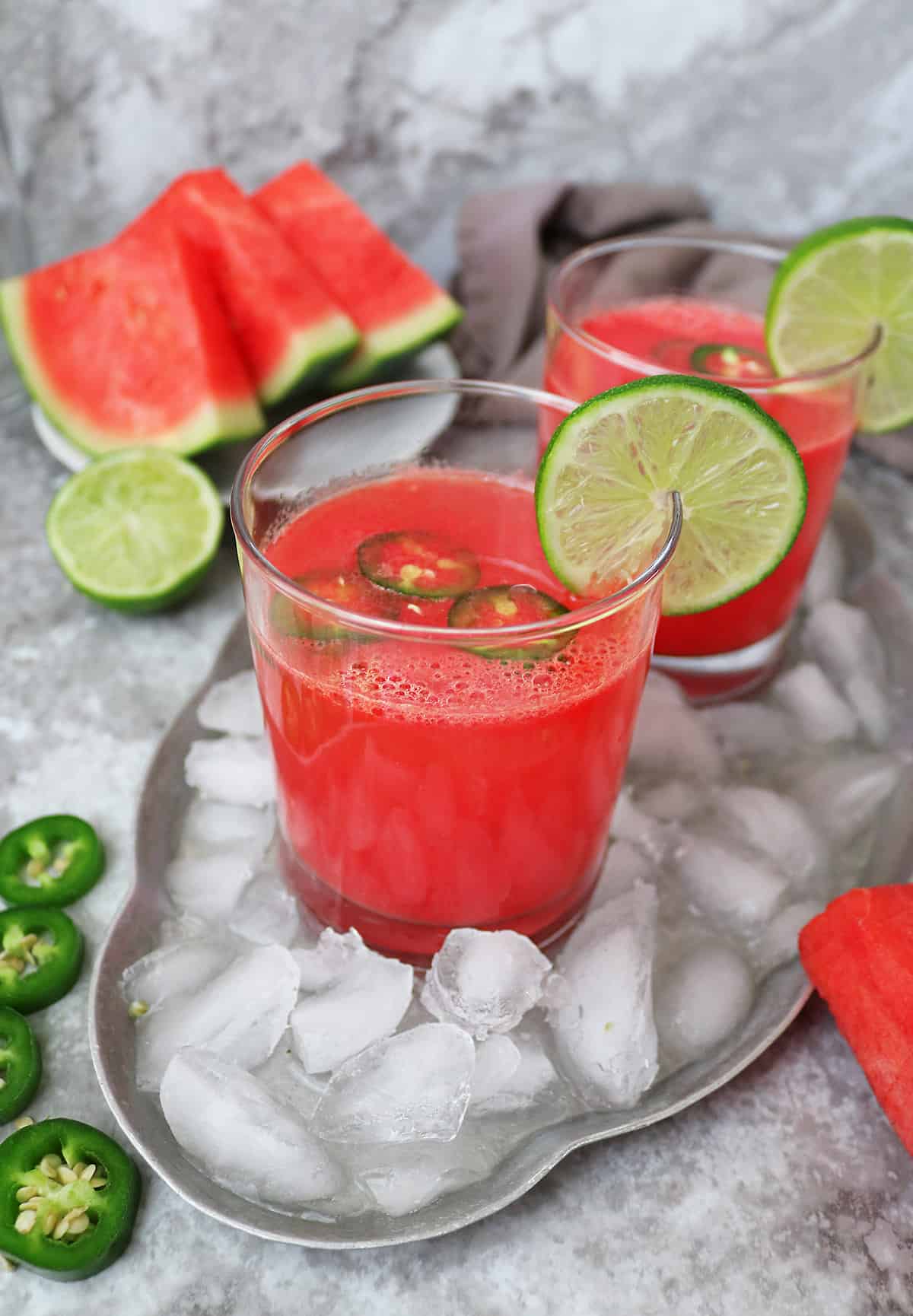two glasses with watermelon paloma mocktails