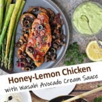 Honey lemon chicken plated with asparagus and wasabi avocado sauce.