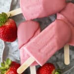 Delicious and easy dairy free strawberry popsicles dipped in ruby chocolate