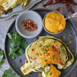 Crispy oven roasted cabbage slice with pumpkin sauce.