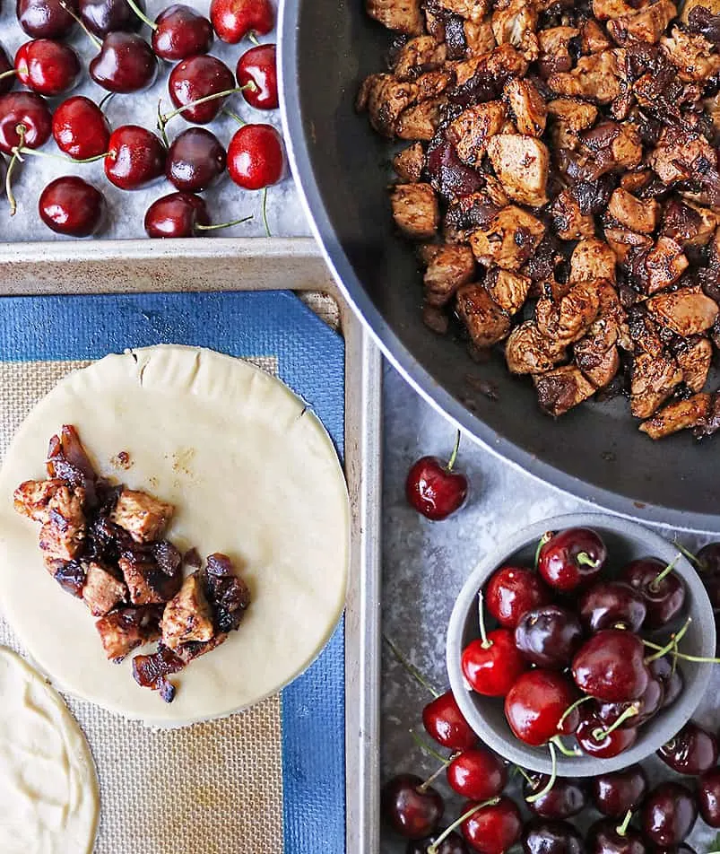 Adding Chicken With Cherries Filling to pie crust