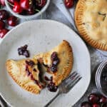 A Savory cherry chicken hand pie on a plate.