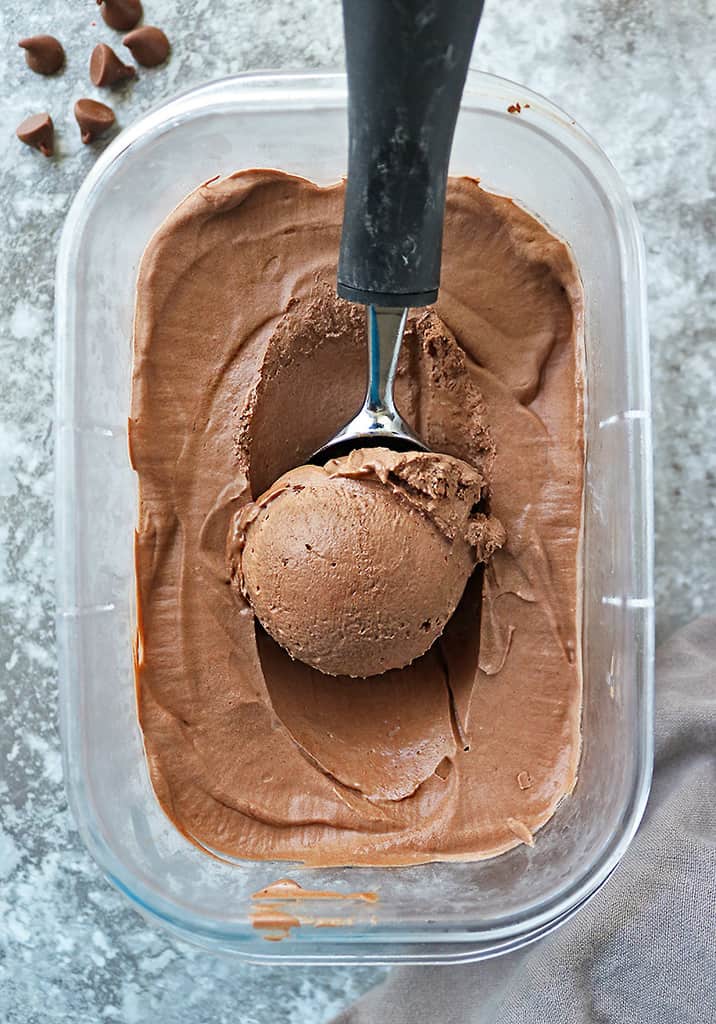 Taking a scoop of Easy vegan chocolate ice cream.