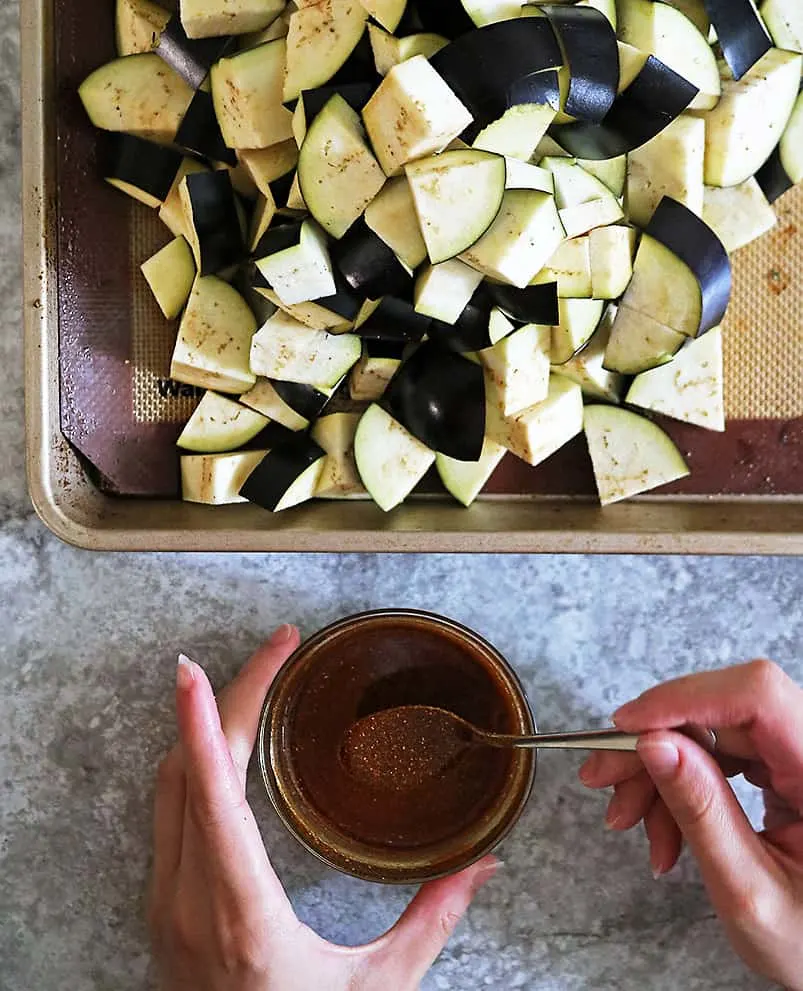 Mixing Oil and spices together to make this sauce to coat chopped eggplant with.