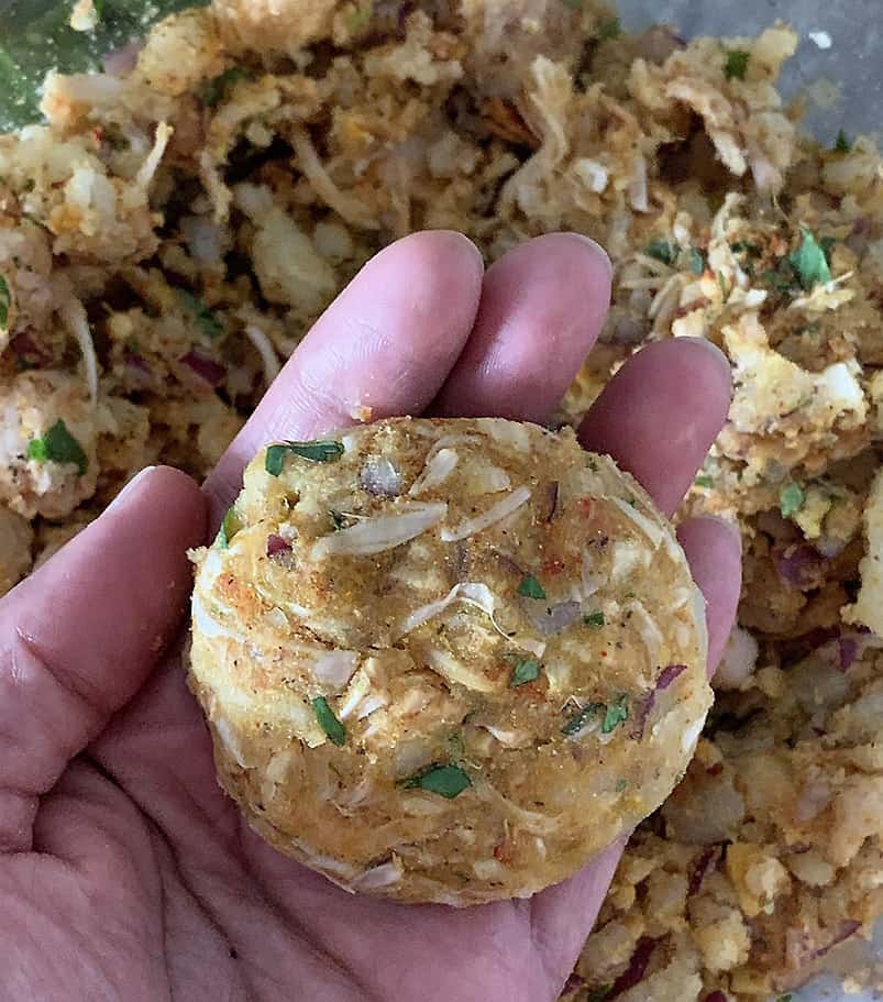 Shaping jackfruit potato cakes before cooking thm.