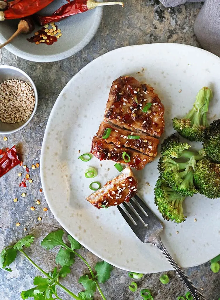 Enjoying Ginger Glazed Pork with broccoli on a plate