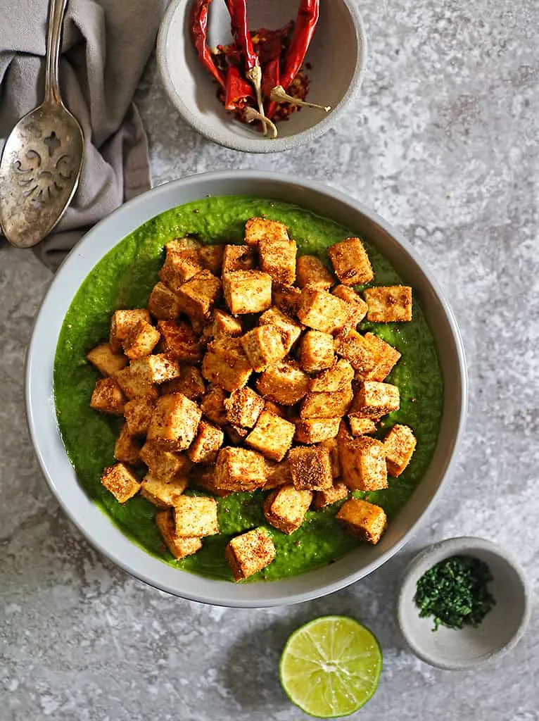 delicious creamed spinach curry sauce with crispy tofu