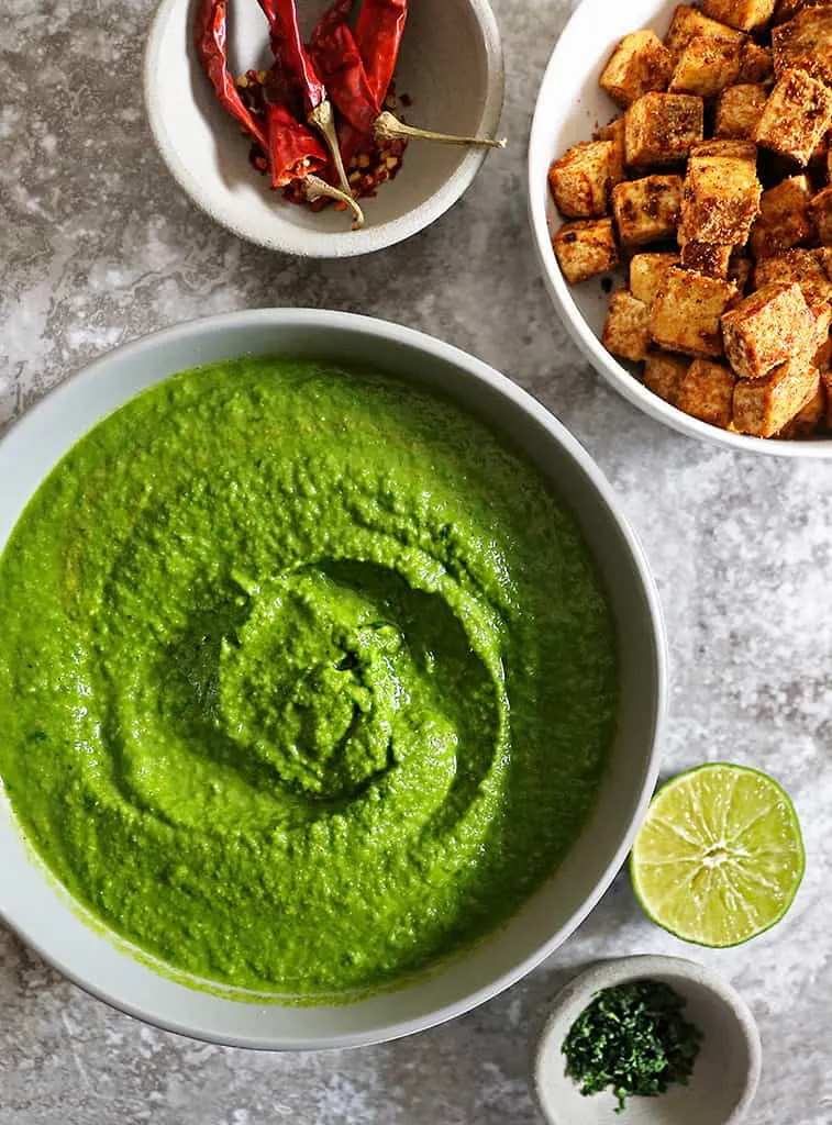 delicious spinach curry sauce and crispy tofu on side