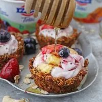 Want a tasty, one-hand way to enjoy granola + Greek Yogurt and fruit? Then, these easy granola cups filled with rich and creamy FAGE Total Split Cup Greek