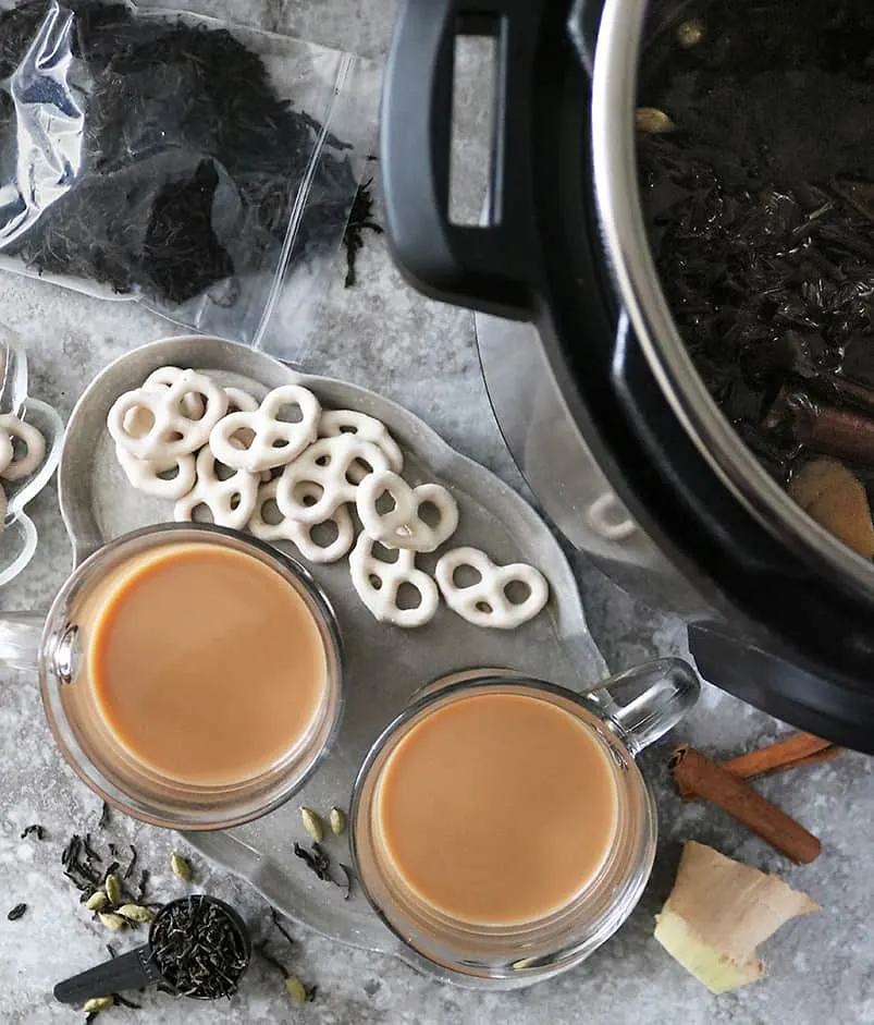 Slow cooker ginger cardamom tea with loose leaf tea and yogurt pretzels from Sprouts bulk bins