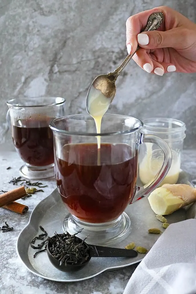 Slow cooker ginger cardamom tea with loose leaf tea from Sprouts bulk bins