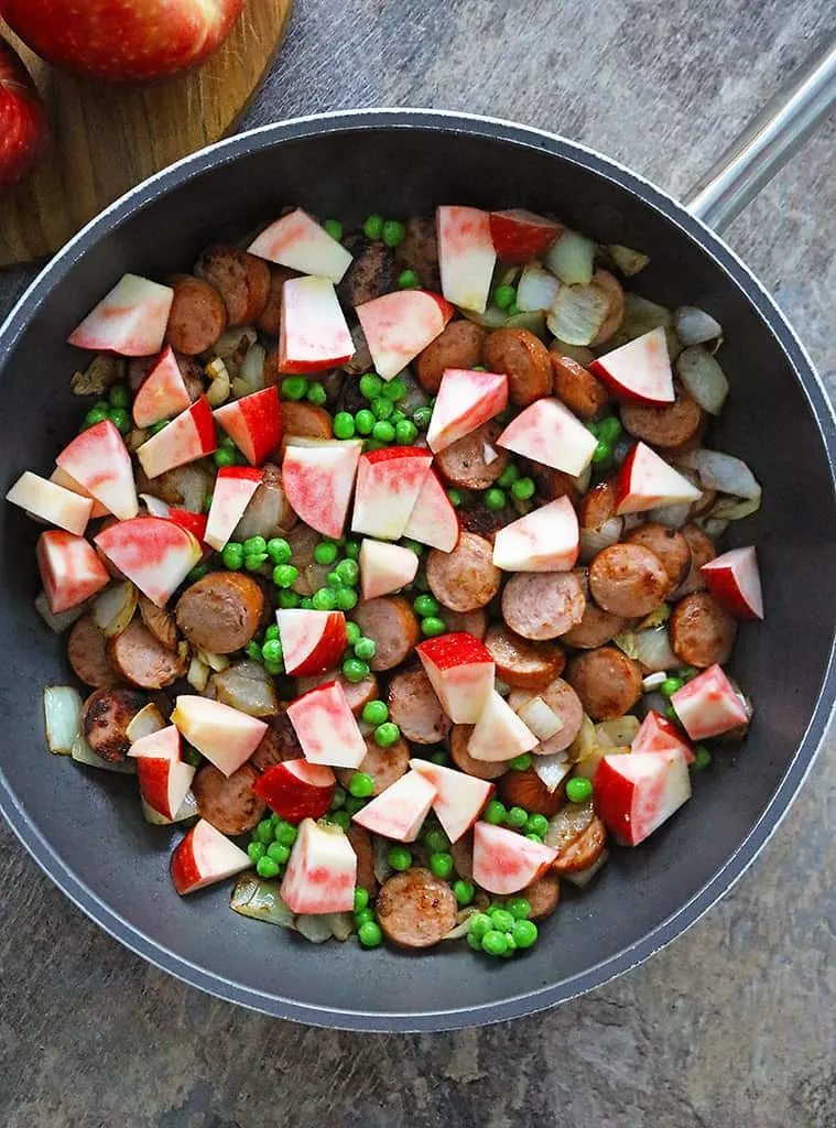 Making sausage apple bake with honey chilies