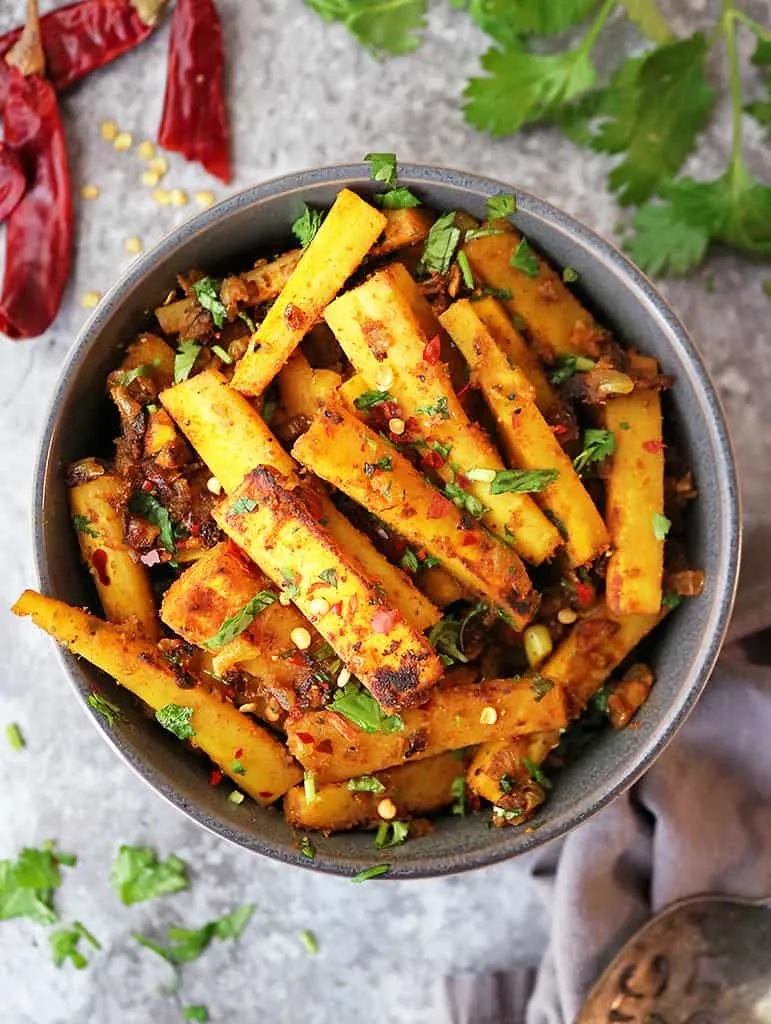 Add a spicy spin to your Thanksgiving and Holiday table with these Golden Pan Roasted Parsnips