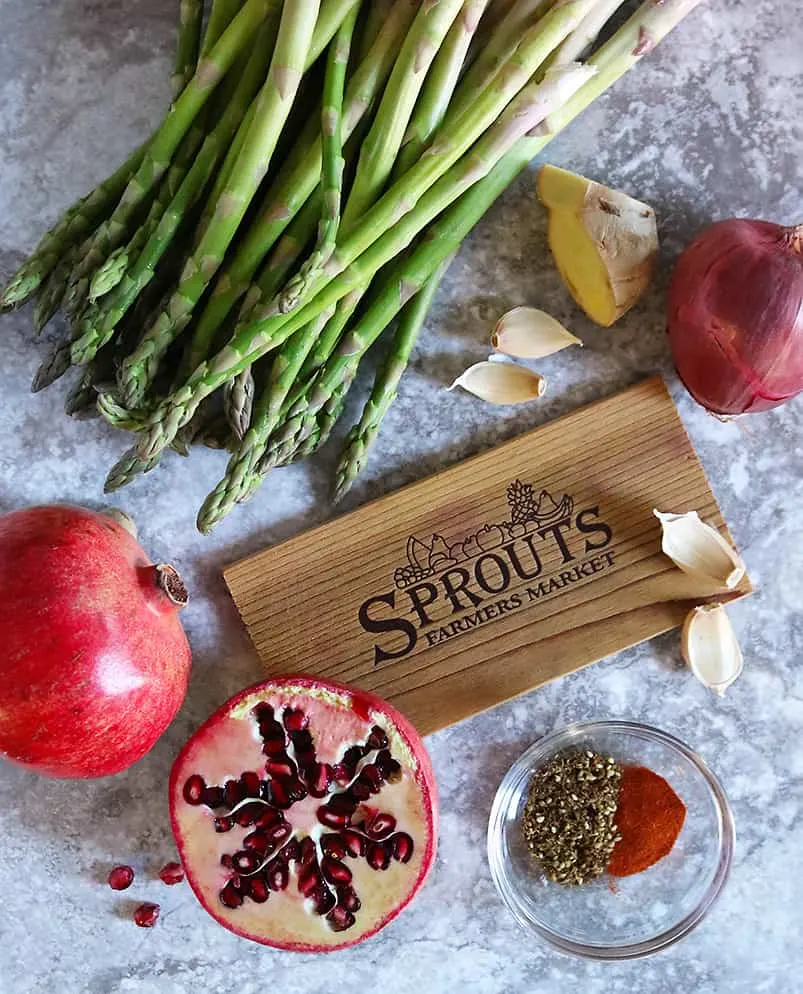 Pomegranates at Sprouts along with other ingredients for Zataar Asparagus with Pomegranate